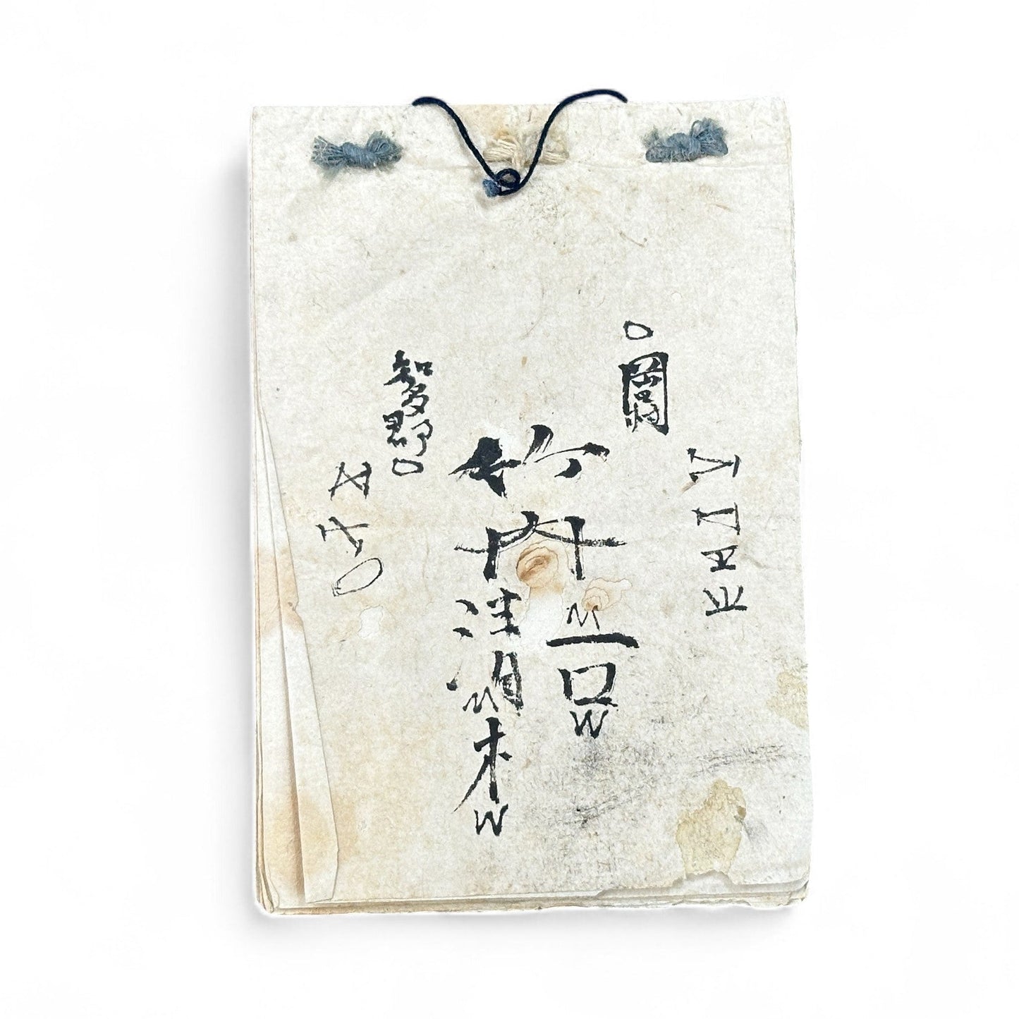 Edo-Meiji handwritten Japanese notebook with hentaigana cursive script on washi paper, tied with string binding.